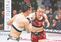 UFC张伟丽：从草量级到金腰带，中国格斗传奇